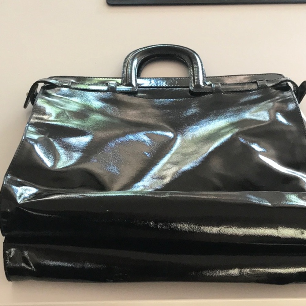 Patent leather Barney’s NY bag.